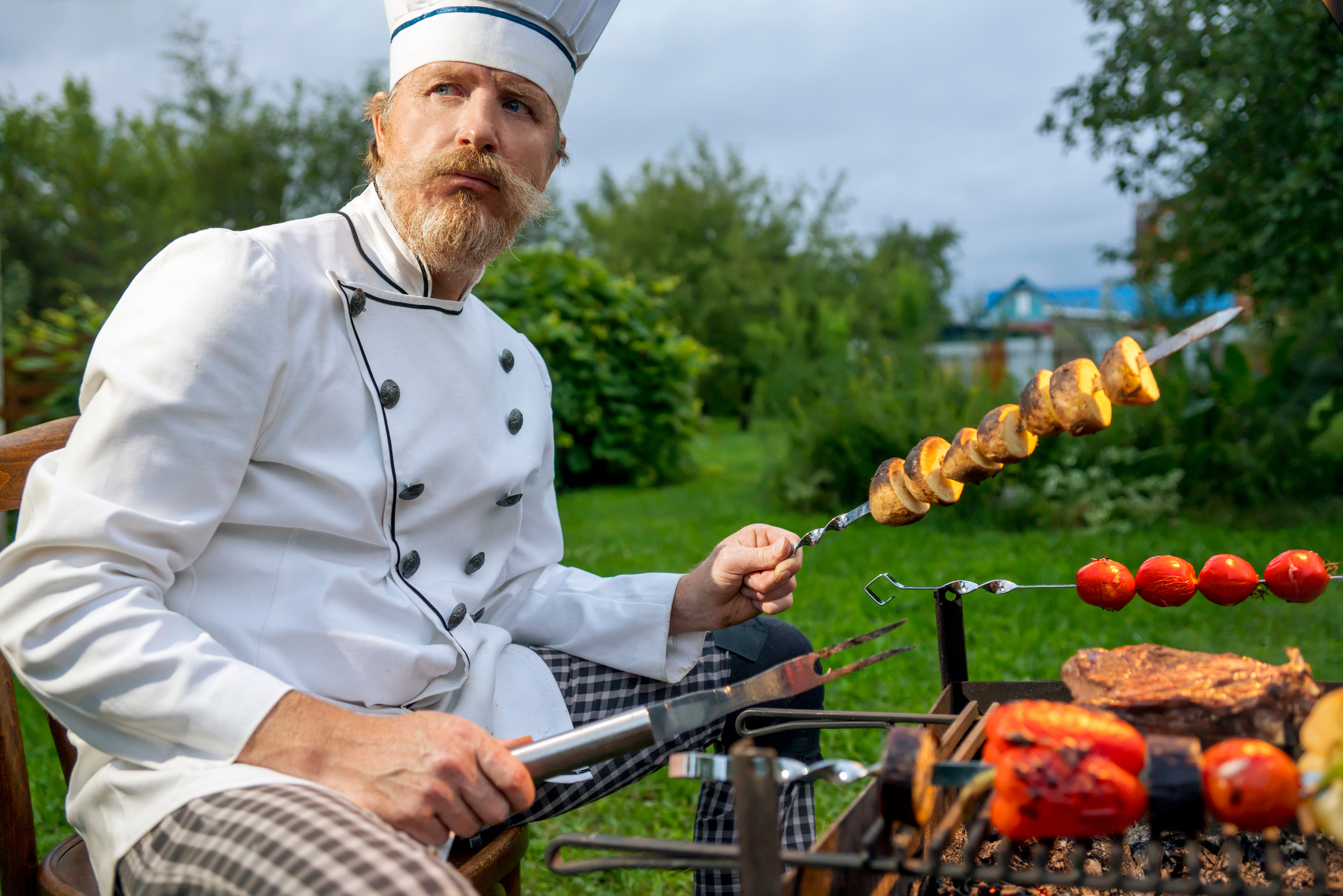 Chef is preparing an outdoor barbecue